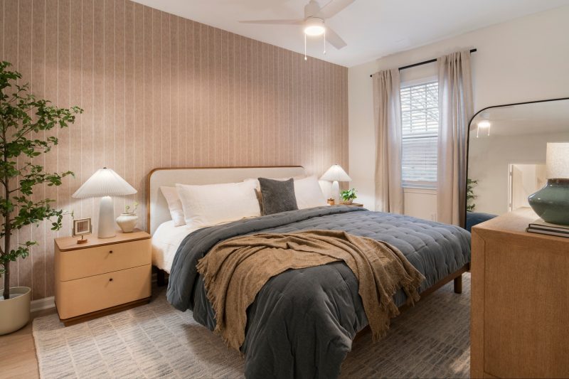 Bedroom with blanket over corner