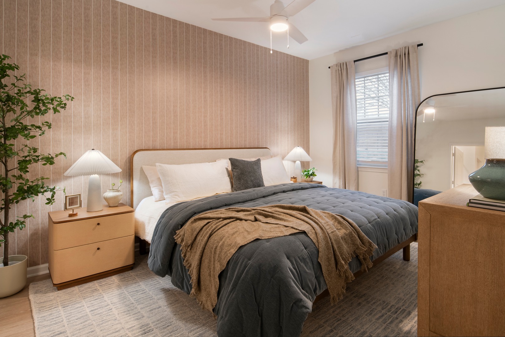 Bedroom with blanket over corner