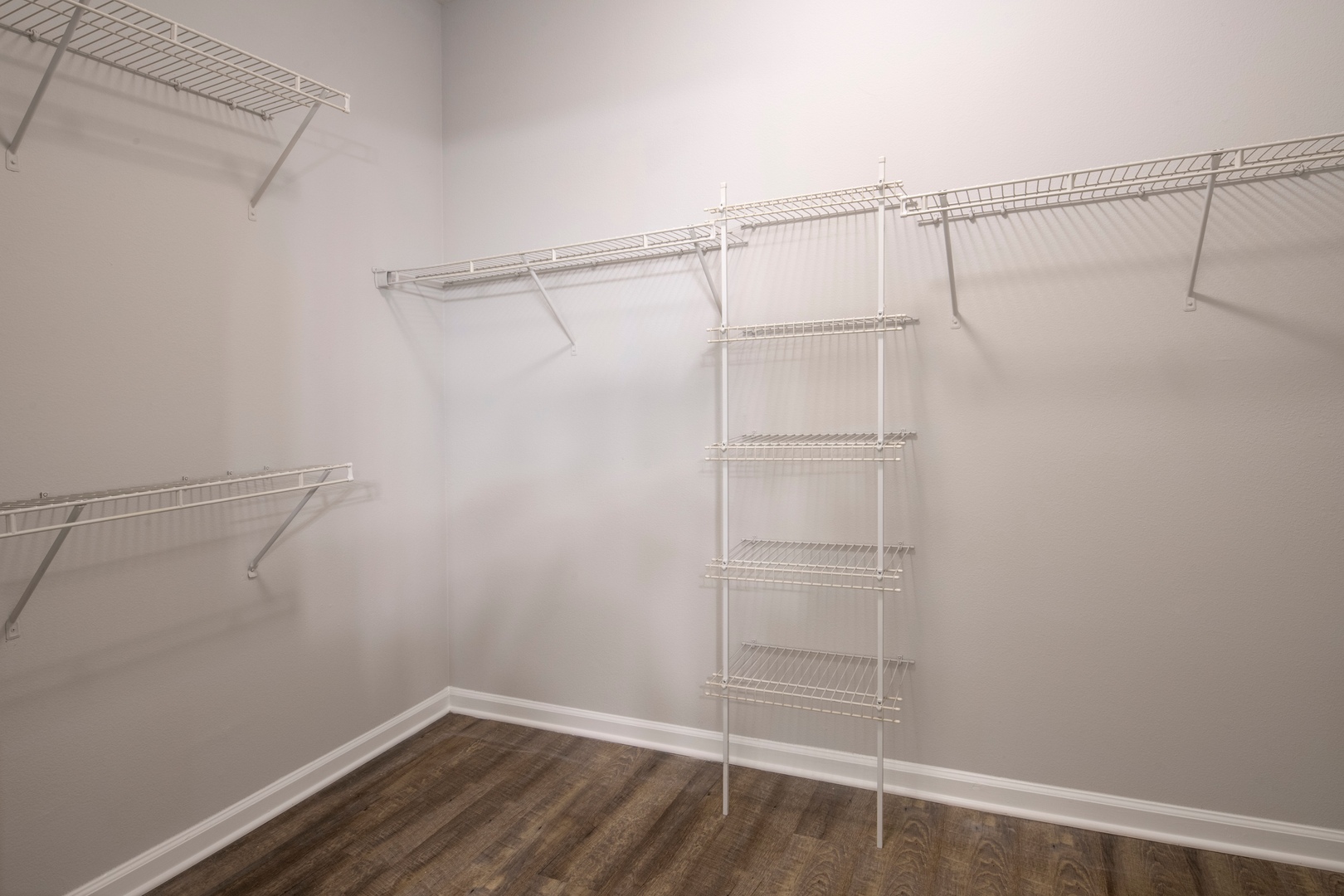 Large walk-in closet with built-in shelving